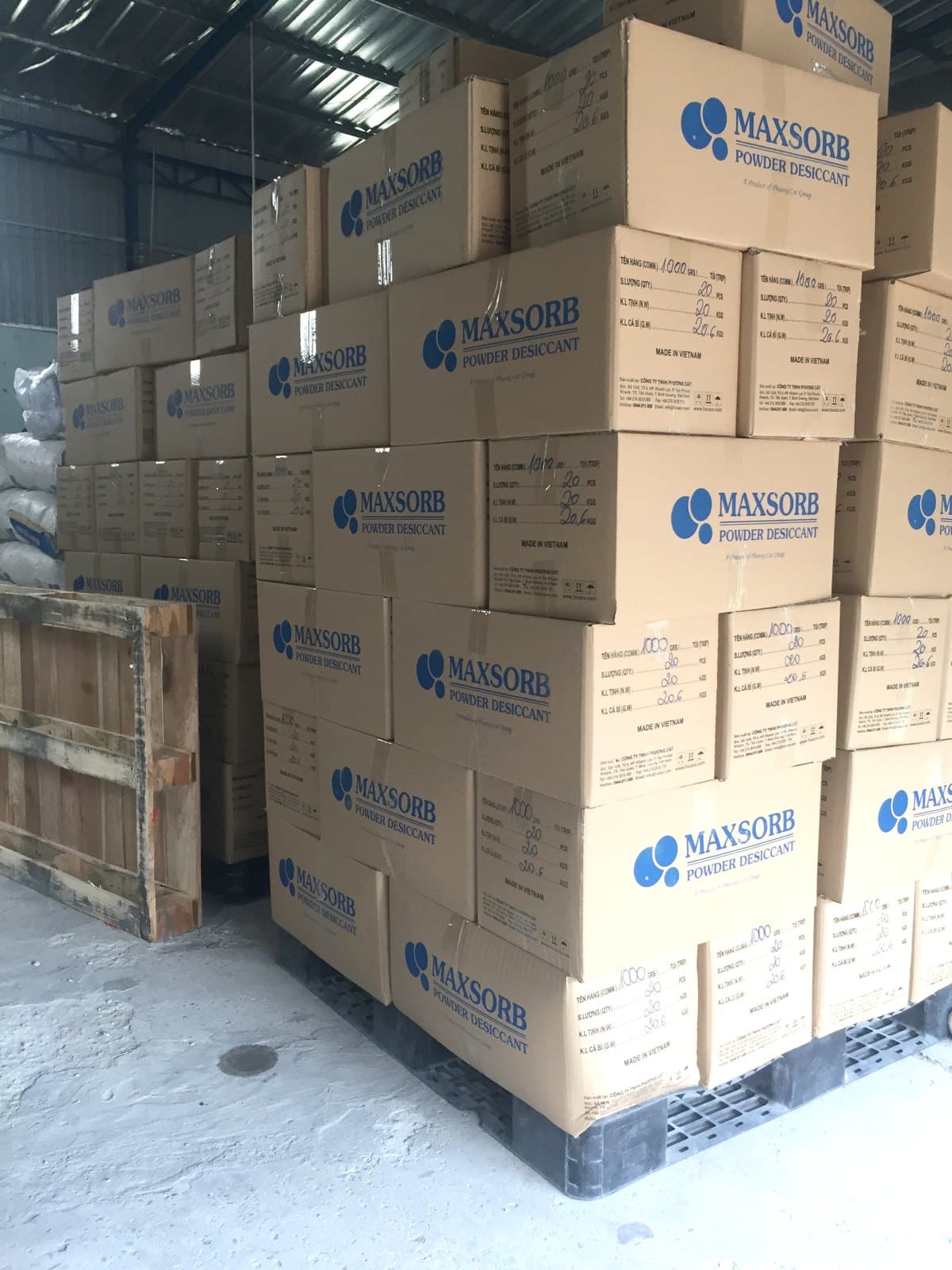 Cartons of finished MAXSORB powder desiccant stacked on a pallet