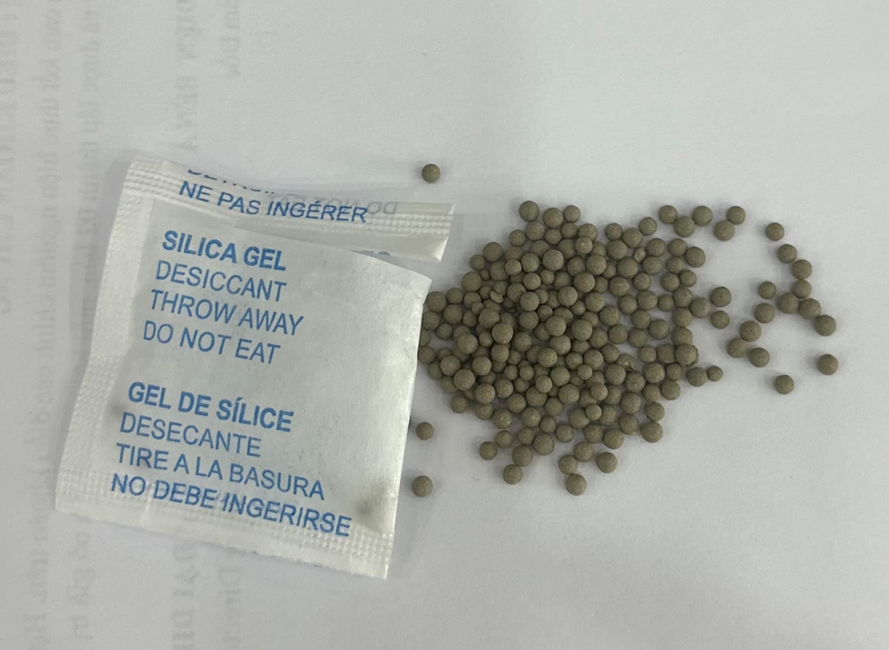 Clay desiccant packs and activated clay granules